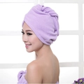 Microfiber hair drying cap in purple worn by a model for strong water absorption - 60*25cm 70g / Purple