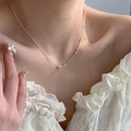 Minimalist silver bead chain necklace with small metal balls worn by a model - Minimalist Bead Satellite Chain (XL3177)