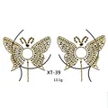 Macro shot of butterfly rhinestone chest stickers XT-39 with silver and gold crystals - XT-39 Gold Silver Butterfly Covers