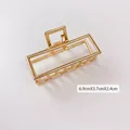 Gold-tone metal shark hair claw clip in rectangular hollow design, 6.9cm size - Medium Rectangular Gold