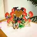 3D greeting card featuring a bouquet of red carnations and butterflies with Thank You text - Carnation