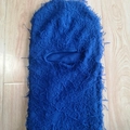 Distressed dark blue knitted balaclava with unique fringe and hole design details - One Size / Blue