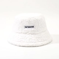 Detailed view of the soft white faux shearling fabric and the embroidered logo patch on the hat - M (56-58cm) / White