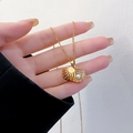 Elegant 18k gold plated shell pendant necklace with pearl and sparkling cubic zirconia - Hollow Pearl Shell / Gold