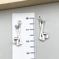 Silver golf club and ball pendants measured at 2.5cm for sports jewelry making - Mini Crossed Golf Clubs