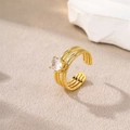 Gold plated stainless steel ring with round clear zircon and twisted rope band - Gold-White Zirconia (Round)