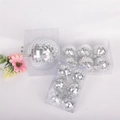 Dettaglio di palline disco a specchio argento in varie dimensioni per torte e feste - 15cm Tappo Cavo / Argento