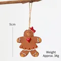 Gingerbread girl Christmas ornament with red bow and heart, 9cm hanging decoration - Heart Gingerbread Man
