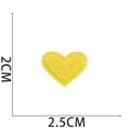 Detail view of a yellow heart embroidered patch showing dimensions 2cm x 2.5cm on white backdrop - No.21-Yellow Heart