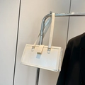 Minimalist cream white vintage shoulder bag with golden buckle and sleek leather texture - Off White