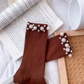 Brown ribbed knit socks with elegant white pearl and flower accents shown on a tray - One Size (EU 34-39) / Caramel