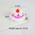 Mini artificial strawberry cream cake keychain in pink and white, size 4.5cm by 4cm - Purple Cake with Red Strawberry
