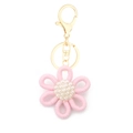 Pink hand-woven daisy keychain with white pearl center and golden metal clasp - Style 9 Light Pink