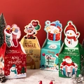 Set of four colorful Christmas gift boxes with festive snowman and reindeer lid designs - Buckle Design Apple Box