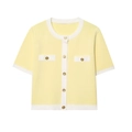 Close-up of yellow knit cardigan with white contrast trim and gold metal buttons - Yellow