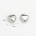 Detail of 15mm heart-shaped zircon charms with Sweetie engraving for DIY jewelry - Heart / Silver