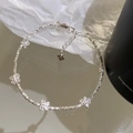 Elegant S925 silver beaded bracelet featuring butterfly charms on a reflective mirror surface - S925 Butterfly Logo (SL1358)