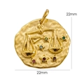 Macro detail of Libra 14K gold stainless steel pendant with hammered texture and colorful gems - Libra