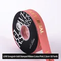 2.5cm lotus pink grosgrain ribbon with gold stamped Love Is Eternal text for bouquets - 2.5cm Wide x 30 Yards Long / Lotus root pink