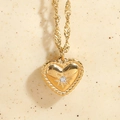Elegant gold heart pendant necklace with starburst zircon and water wave chain - Heart / Gold
