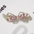Bow-shaped spring hair clip with pink crystals, faux pearls and golden alloy finish - Luan Si Cherry Blossom Pink