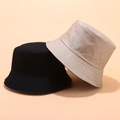 Detail of cotton sun hats in black and beige with precision stitching and foldable brim - M (56-58cm) / Black & Khaki