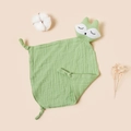 Detail of green fox muslin baby comforter with soft organic cotton texture and knot ties - Grass Green