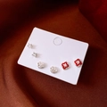 Detail of 6-piece earring set featuring zircons, silver Ruyi locks, and red enamel flowers - Flower Ruyi Lock 6-Piece Set / Silver/Red