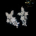 Détails des boucles d'oreilles papillon en argent avec zircons étincelants et effet d'éclat - Paire de Boucles d'Oreilles à Clip / Argenté