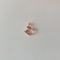 Rose gold metal clip-on earring converter with screw adjustment on white background - Earring Converter - Rose Gold (1 Pc)