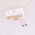 Macro view of gold stainless steel earring set with clover and evil eye charms - Evil Eye Long Chain Style (6#)
