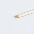 Minimalist gold clavicle chain necklace featuring a polished letter M initial pendant - Letter M