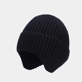 Detail of black ribbed knit beanie featuring warm ear flaps and thick wool texture - Black