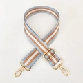Detail of adjustable nylon bag strap with light blue, white, and gold glitter stripes - Light Blue