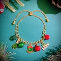 Christmas charm bracelet in gold finish with festive Noel tree and bell pendants - Christmas Bell Style (7082)