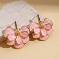 Roze ginkgo bloem oorknopjes met gouden rand en getextureerd metalen midden - Roze