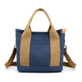 Blue canvas tote bag with khaki straps and detachable shoulder strap in a variant view - Dark Blue