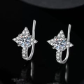 Silver star-shaped stud earrings with round moissanite and halo stones on black background - Five-pointed Star Ear Hook Led-145