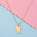 Macro detail of half heart pendant in gold polished steel with fine O-chain link - Large Gold Single Piece