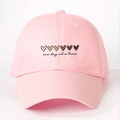 Pink baseball cap featuring gradient heart prints and one day at a time text on white background - One Size / Pink