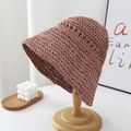 Detail of handwoven texture on a foldable straw bucket hat in dusty pink color - Dusty Pink