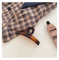 French style amber tortoiseshell claw clip for hair styling shown with accessories - Tortoise