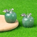 Paio di ciondoli a forma di mela in cristallo verde con foglie in metallo argento - Avventurina Verde