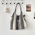Hanging canvas tote bag featuring black and white polka dots and stripe patchwork detail - Vertical Stripe Polka Dot Black