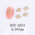Macro shot of 9.5x7mm alloy crown nail charms with crystal rhinestones on white base - Crown Style (AH34)