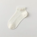 Beige mesh boat socks featuring delicate lace trim and a decorative silk bow detail - One Size / White