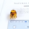 Detail view of a 2cm amber tortoiseshell hair claw clip for elegant half-up hairstyles - 2cm / Tortoise