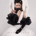 Detail of elegant black satin bridal gloves with pleated mesh flowers and pearl accessories - ST180 2080 Double Layer Ruffle Sleeves
