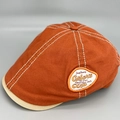 Detail of retro canvas newsboy hat featuring caramel crown and beige contrast stitching - M / Orange Red