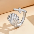 Silver open sea-themed ring featuring a detailed seashell and starfish design - J03124 / Silver